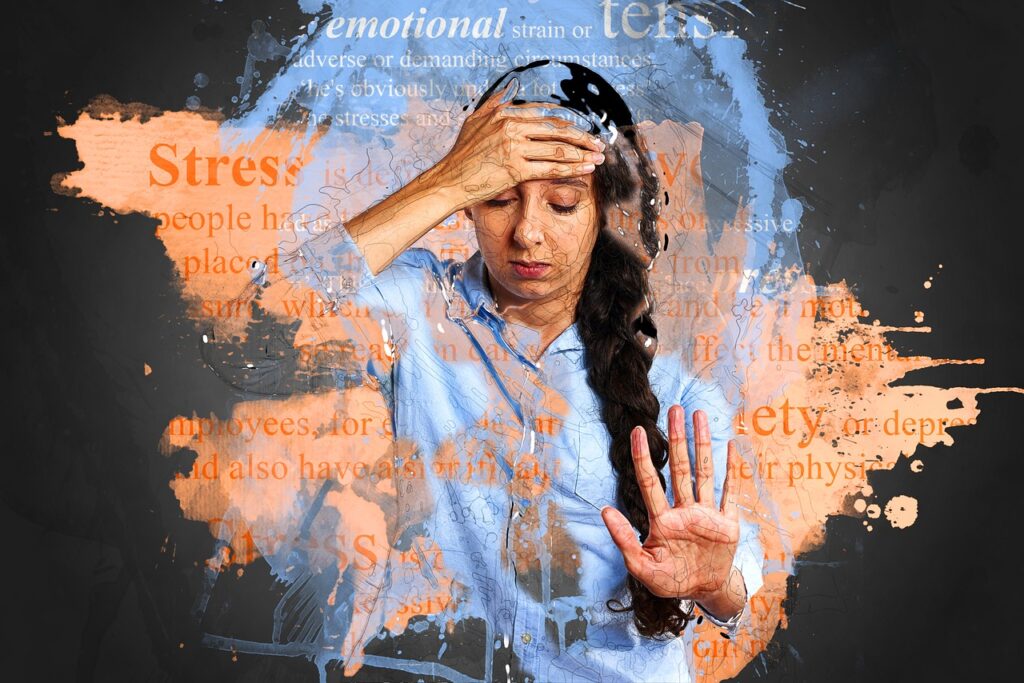 ﻿﻿Emotionally strained woman holding palm on forehead﻿﻿