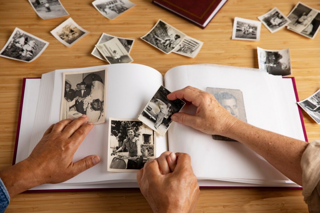 Senior couple looking through old photo album