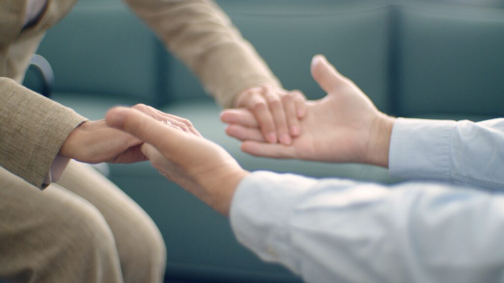 Holding hands for support